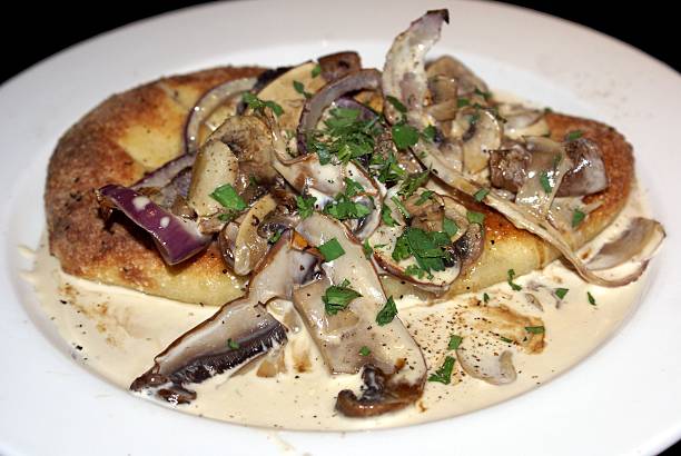 istock pita bread with mushroom, onion, & cream sauce 480915638