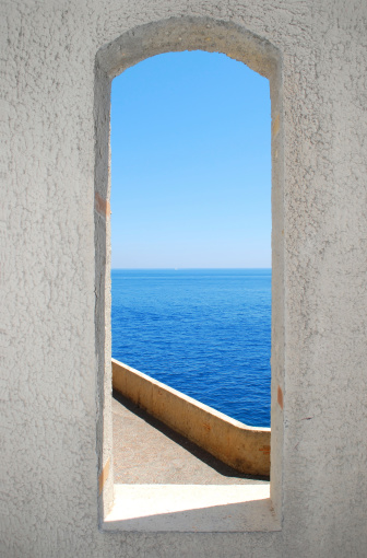 View of the sea through a window