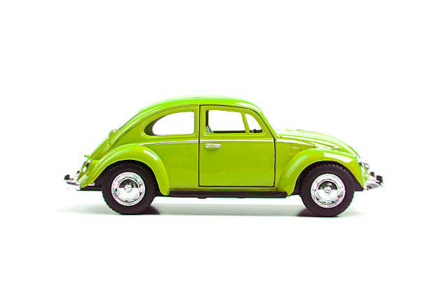 Volkswagen Beetle Izmir, Turkey - January 5, 2013: Vintage toy Volkswagen car close up image on isolated white background. beetle photos stock pictures, royalty-free photos & images