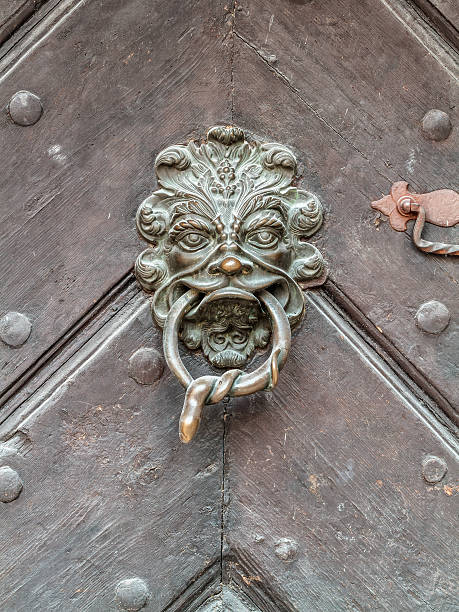 istock Vintage doorknob on antique door, background 480930479