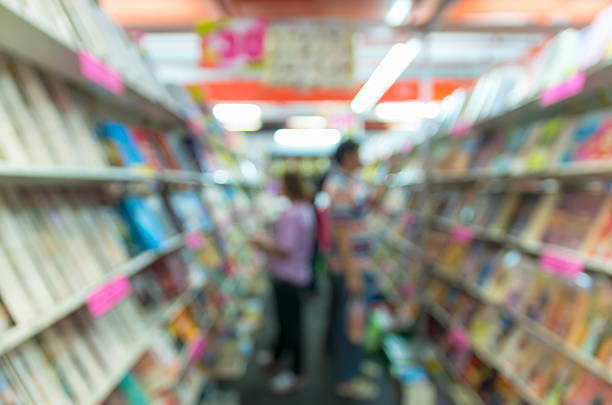 istock Abstract blurred photo of book store with people background 480935016