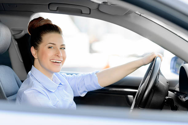 istock business woman in car 480937253