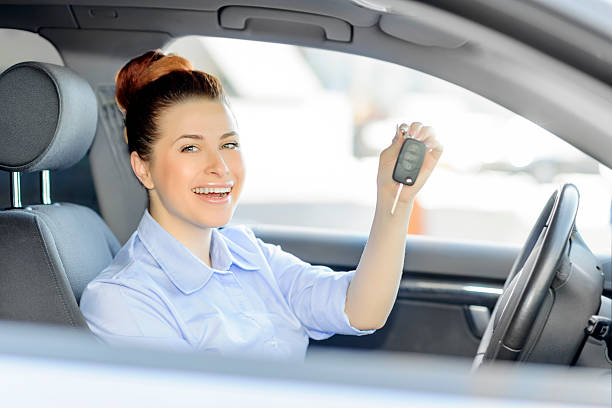 istock woman in her new car 480937451