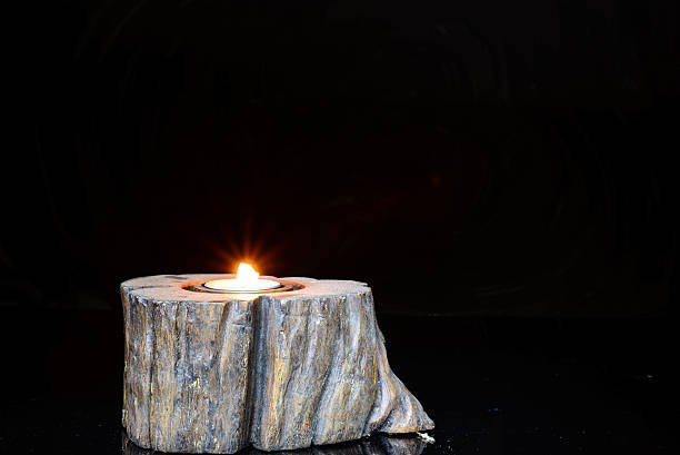 istock Candle flame closeup isolated on black. 480938540