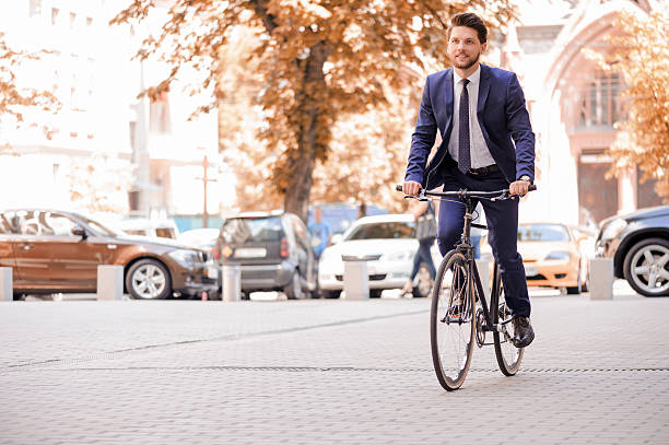 istock Handsome businessman riding his bicycle 480939006