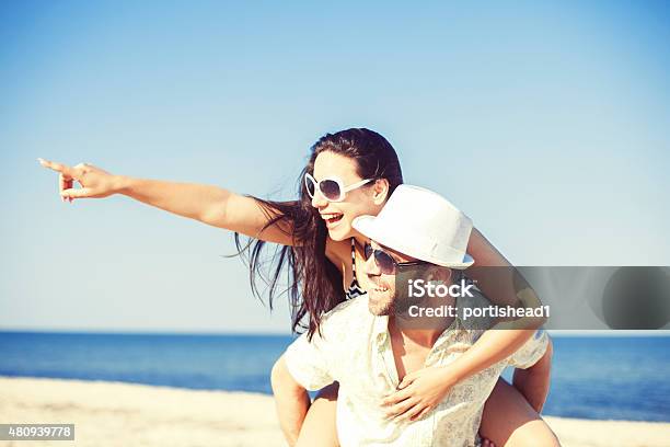 Happy Young Couple Having Fun Stock Photo - Download Image Now - 2015, 30-39 Years, Adult