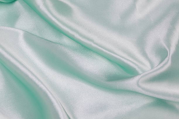 istock Light green Silk cloth of wavy abstract background 480940768