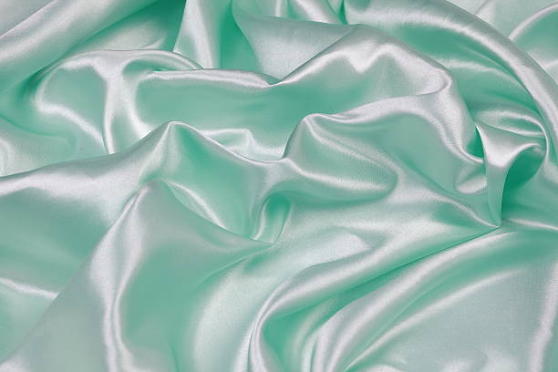 istock Light green Silk cloth of wavy abstract background 480945882