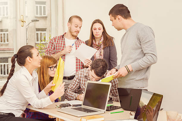 istock Young group of people discussing business plans 480946682
