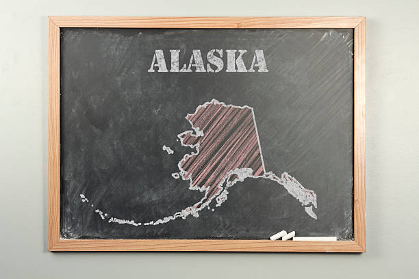 Alaska State Outlined Alaska US state on grade school chalkboard alaska us state photos stock pictures, royalty-free photos & images