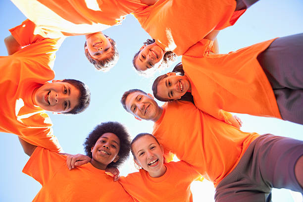 istock Coach with group of children 480952837