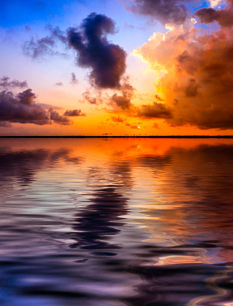istock Dramatic sky cloudscape on a tropical sea at sunrise 480953301