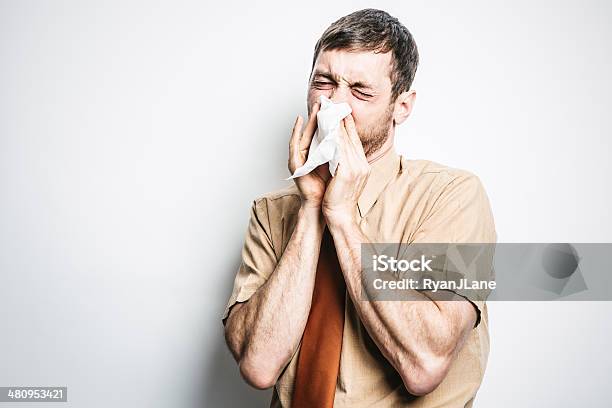 Man With Cold Sneezing Stock Photo - Download Image Now - Cold And Flu, Adult, Adults Only