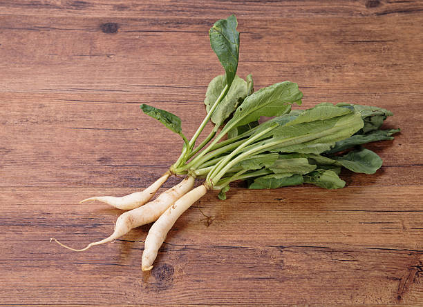 istock Daikon radish on the wood background 480954790