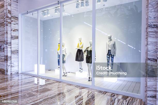 Mannequins In Fashion Shop Display Window Stock Photo - Download Image Now - Store Window, Retail Display, Store