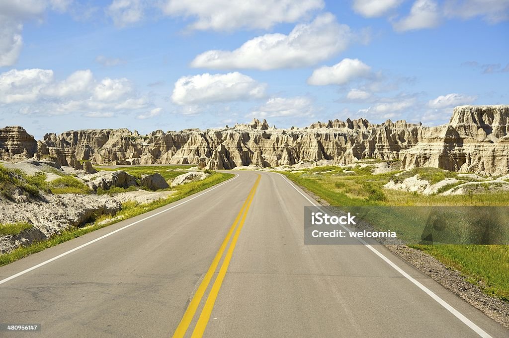 Badlands Highway Badlands Highway - Badlands Loop Road. South Dakota, USA. Scenis Road in the Badlands National Park. Arranging Stock Photo
