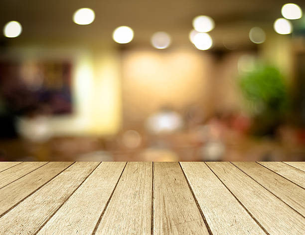istock Perspective wood and blurred cafe background. product display 480957654