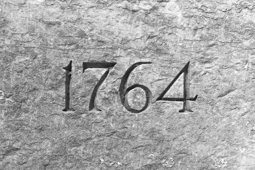 Granite wall with the year 1764 etched in stone