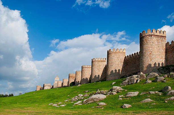 city ​​walls of Avila, with a green garden stock photo