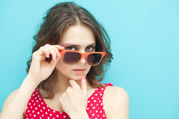 istock beautiful girl in sunglasses 480963541