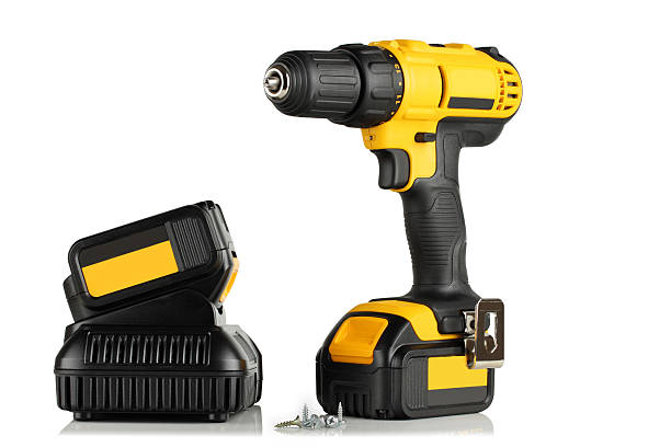 istock Handheld cordless power drill, battery, charger and screws. 480963719