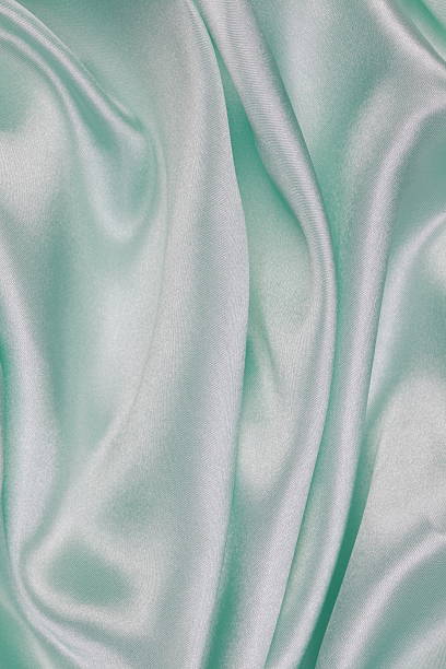 istock Light green Silk cloth of wavy abstract background 480963828