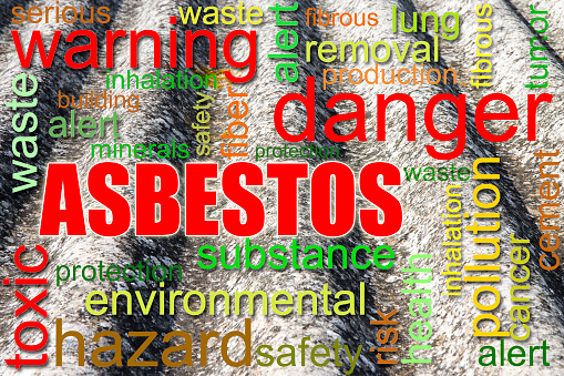 Dangerous asbestos roof concept image - Medical studies have shown that the asbestos particles can cause cancer