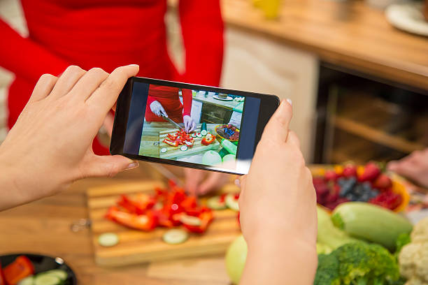 istock Photographing with smart phone food preparation process. 480966086