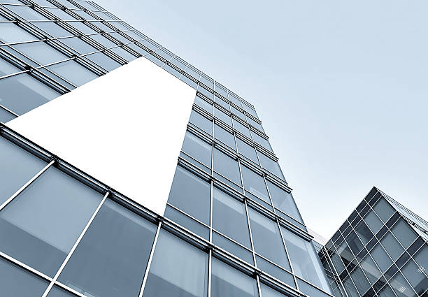 istock blue glass wall with blank placard of skyscraper 480967989