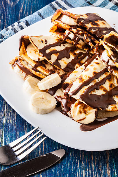 istock Crepes with banana and chocolate cream 480972498