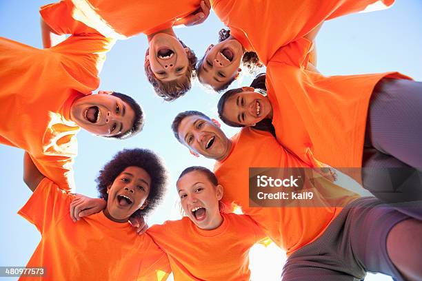 Coach With Group Of Children Stock Photo - Download Image Now - Summer Camp, Child, Sport