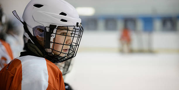 Teenage Hockey Player on the Bench