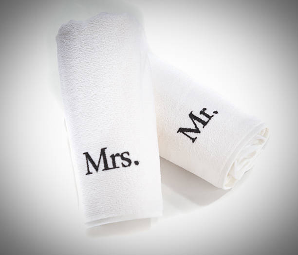 istock mr and mrs rolled white towels isolated 480980311