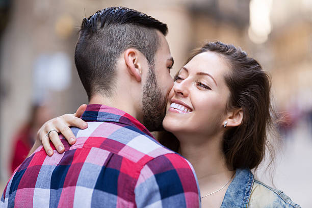 istock Happy woman hugging her male 480981480