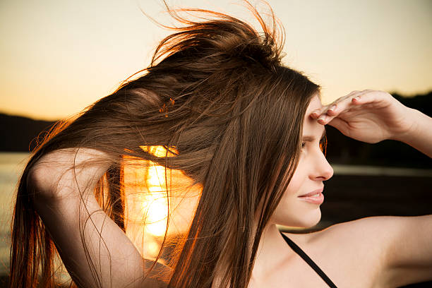 istock Beautiful woman in bikini on sunset background 480981562