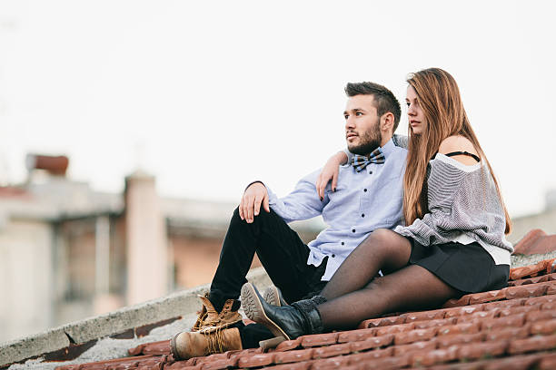 istock Young Couple Together At The roof 480986345