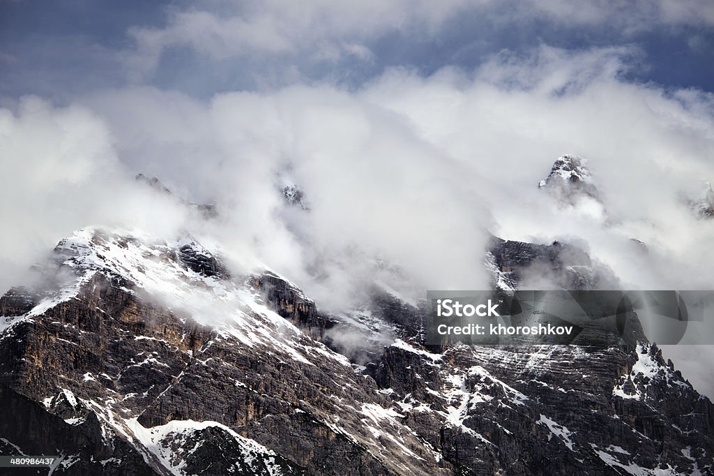 Rocky mountains above Cortina D'Ampezzo Rocky mountains above Cortina D'Ampezzo. Italian Dolomites Cloud - Sky Stock Photo