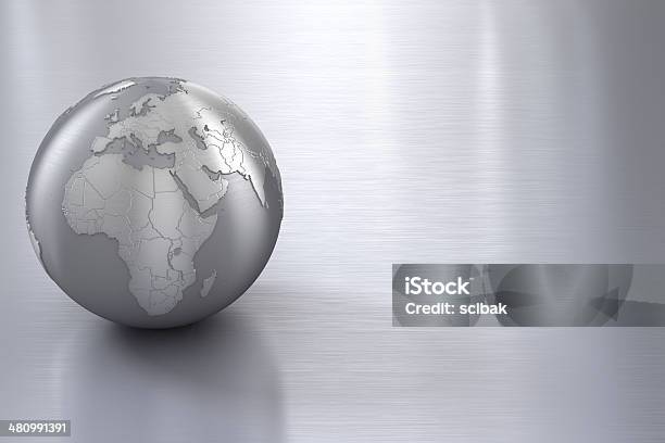 Silver Globe On Stainless Steel With Copy Space Stock Photo - Download Image Now - Globe - Navigational Equipment, Aluminum, Planet - Space