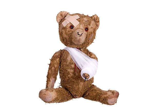 enfermo teddybear - child physical injury teddy bear wound fotografías e imágenes de stock