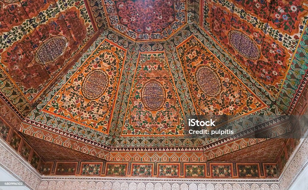Painted wooden ceiling of the Bahia Palace in Marrakesh Painted wooden ceiling of the Bahia Palace in Marrakesh,Morocco 2015 Stock Photo