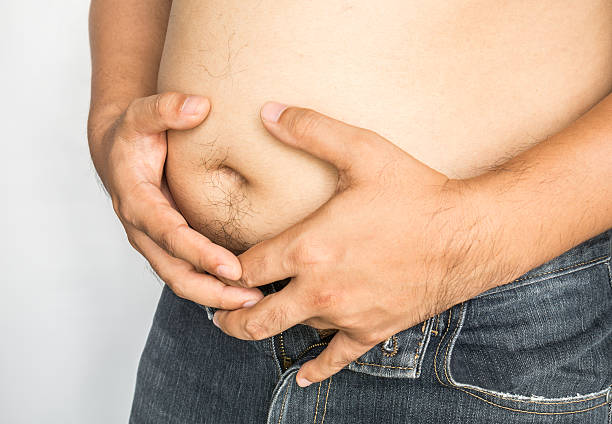 istock Fat man with big belly on white background 480997784