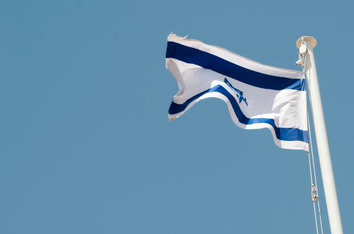 Flag of Israel with pole waving in the wind