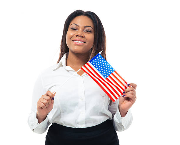 istock Happy african busiensswoman holding US flag 481002214