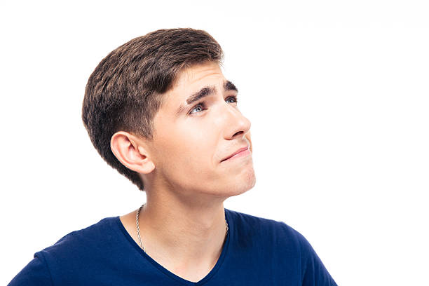 istock Closeup portrait of a young man looking up 481004582