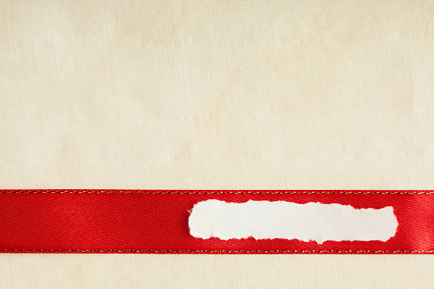 istock Piece scrap paper blank copy space red ribbon cloth background 481006155