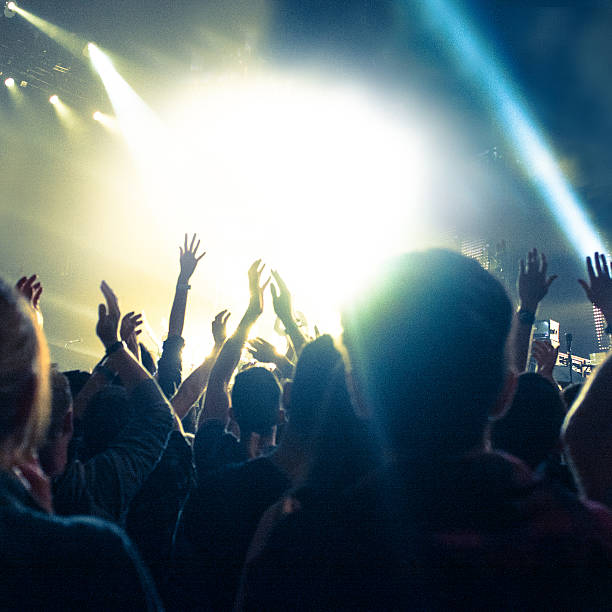 istock Concert Lighting, arms in the air 481008127