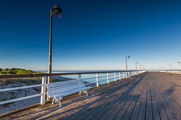 istock Beautiful wooden pier on Baltic sea shore 481009542