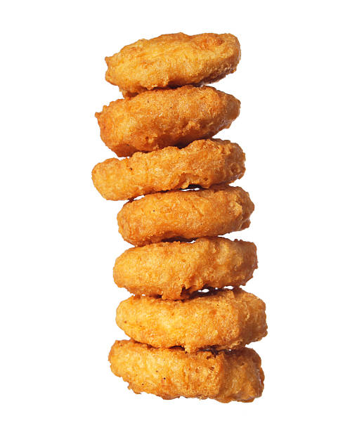 Chicken Nuggets Tower isolated Chicken Nuggets Tower isolated on white nuggets heat stock pictures, royalty-free photos & images