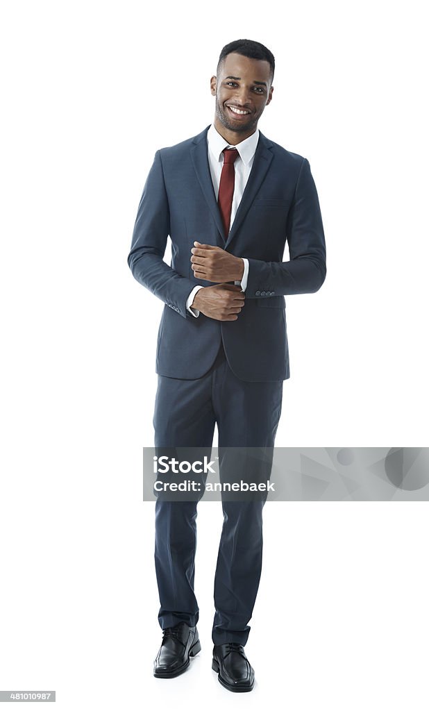 Feeling ready to succeed! A happy businessman isolated on white while smiling Arms Crossed Stock Photo