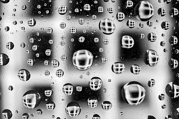 istock water droplets as small lenses over a colored background. 481016717